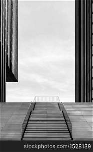 Wide stairway between two modern office buildings at the Medienhafen (media harbour) in Dusseldorf, Germany. Toned.