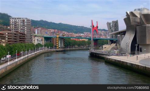 Wide tilit shift Left panning timelapse of Bilbao Guggenheim