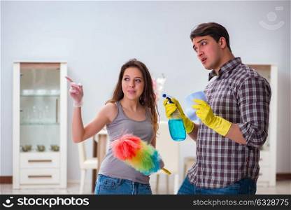 Wife and husband doing cleaning at home