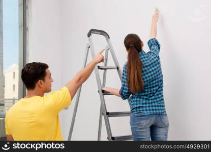 Wife and husband family doing home improvements