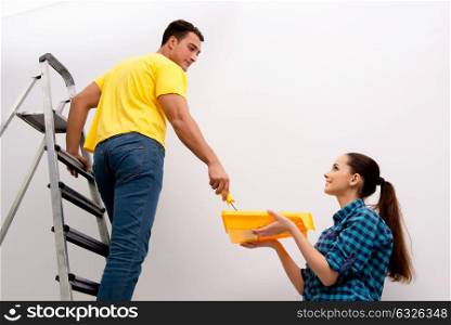 Wife and husband family doing home improvements