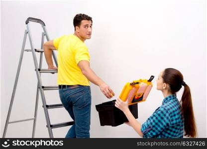 Wife and husband family doing home improvements