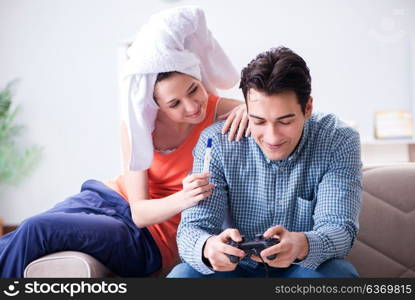 Wife and husband looking at pregnancy test