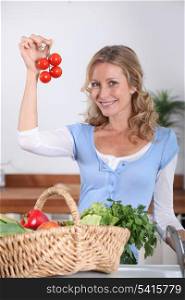 Wife holding tomatos