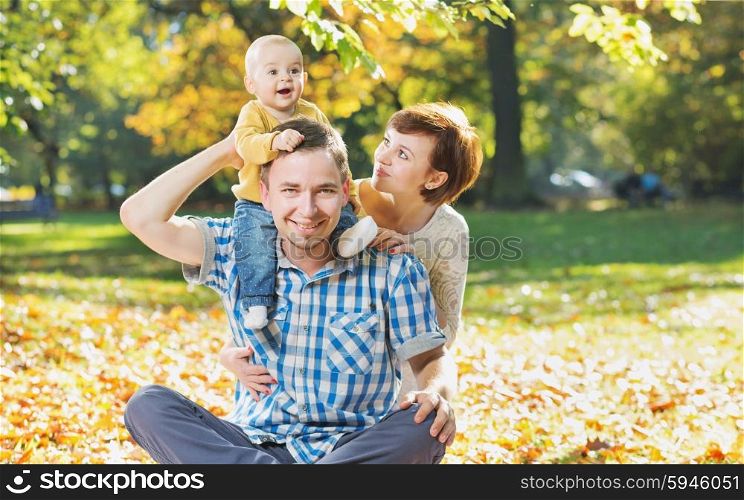 Wife hugging husband and child