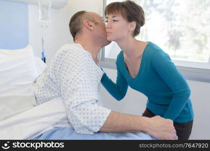 wife visiting husband in hospital