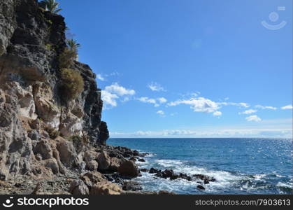Wild and rocky coast by the resort San Augustin at the island Gran Canaria in Spain