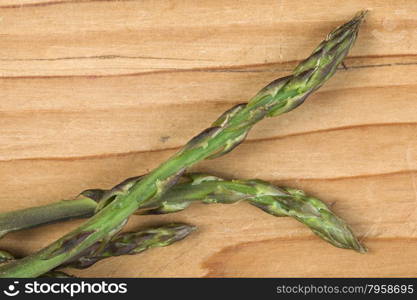 Wild Asparagus on Wooden Table