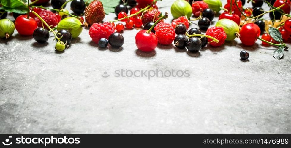 wild berries on the old stone table.. wild berries on the stone table.