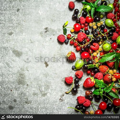 wild berries on the old stone table.. wild berries on the stone table.