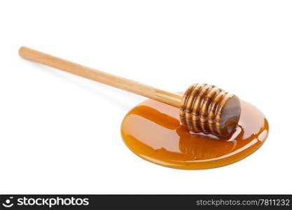 wild honey and wooden dipper isolated