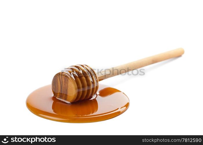 wild honey and wooden dipper isolated