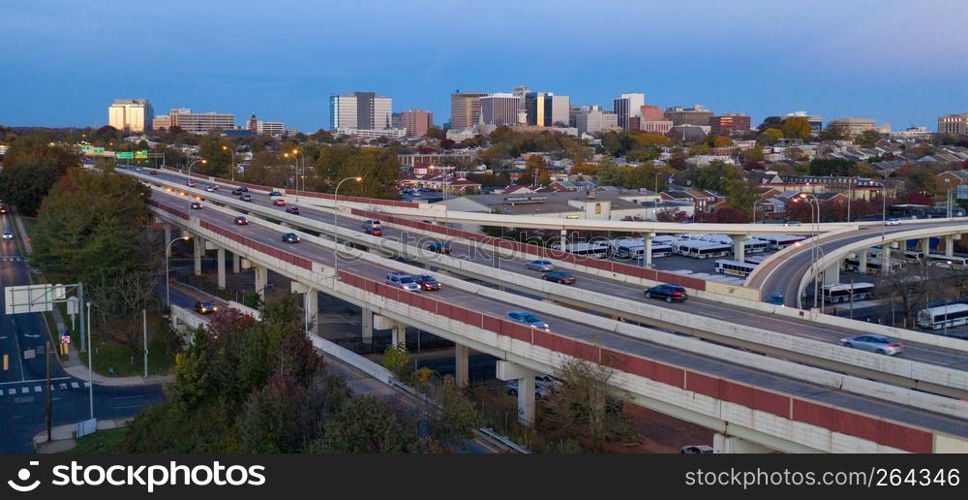 Wildington Delaware exists on both sides of the elevates highway glowing at dusk