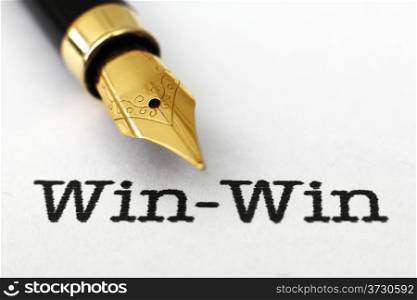 Win win text and fountain pen