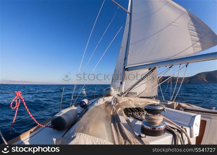 Winch with rope on sailing boat in the sea&#xA;