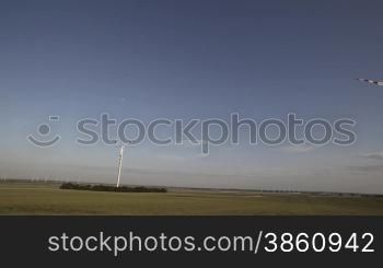 Wind energy turbines wirh wind mills in horizon
