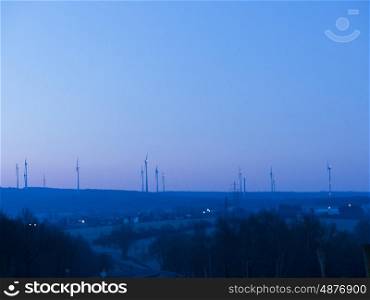 Wind farm . Wind farm in operation at sunrise