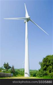 Wind power generation machine under blue sky