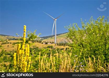 Wind power plant turbines on Velebit mountain region karst, windy area of Croatia