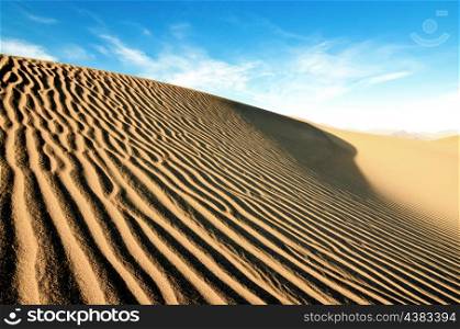 Wind swept sand creating ridges on a Death Valley sand dune in California.