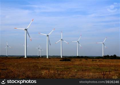 Wind turbine farm in Dobruja region near Kavarna in Bulgaria at sunset