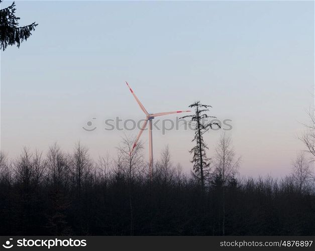 Wind turbine in operation in the forest &#xD;&#xA;