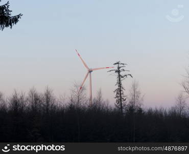 Wind turbine in operation in the forest &#xD;&#xA;