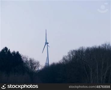 Wind turbine in operation in the forest &#xD;&#xA;