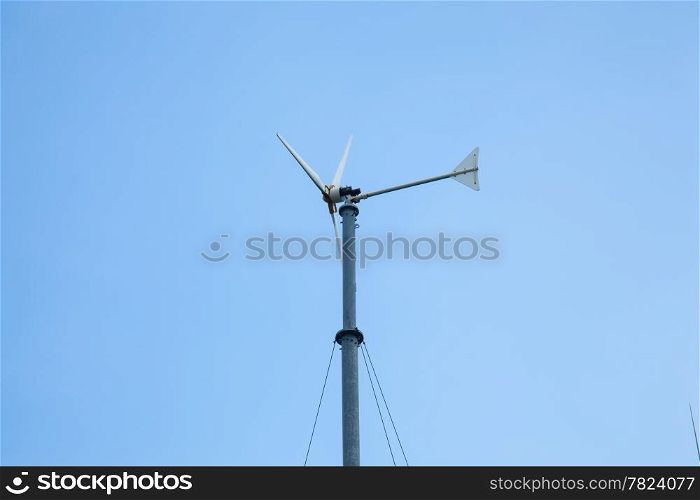 Wind turbine to produce electricity with wind. Installed alongside the sea.