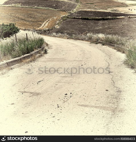 Winding Asphalt Road between Fields of Sicily, Retro Image Filtered Style