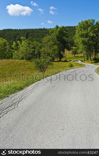 Winding Asphalt Road in the French Alps