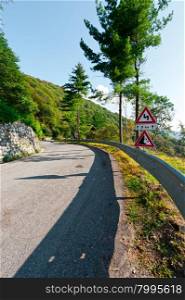 Winding Asphalt Road in the Italian Alps