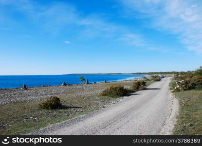 Winding coastal road at the northern part of the swedish island Oland.