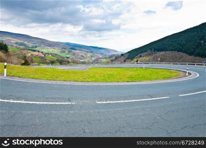 Winding Mountain Road on the Background of Pyrenees