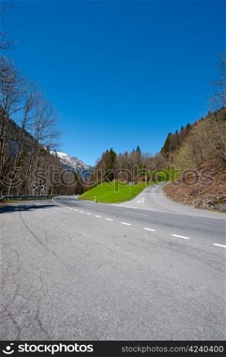 Winding Paved Road in the Swiss Alps