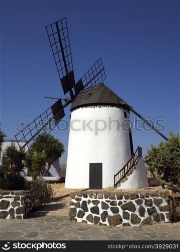 Windmill on Fuerteventura, one of the Canary Islands, in the Atlantic Ocean off the coast of Africa. (politically part of Spain). It was declared a biosphere reserve by UNESCO in May 2009.
