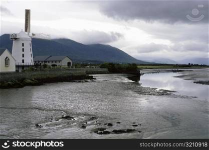 Windmill on the banks of a river, Blennerville, Republic of Ireland