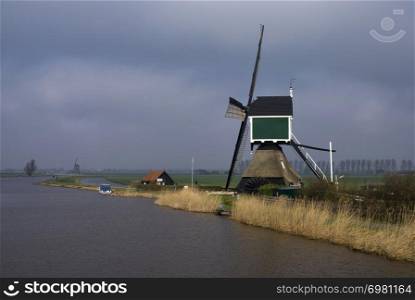 Windmill the Achterlandse molen near the Dutch village Groot-Ammers in the region Alblasserwaard. Windmill the Achterlandse molen