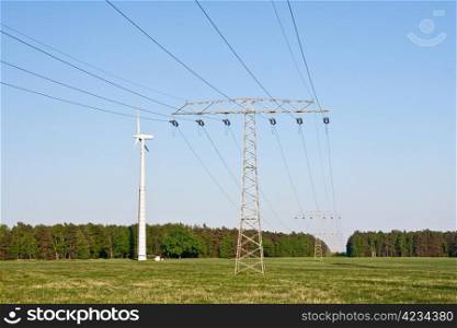 windmill together with high voltage powerlines