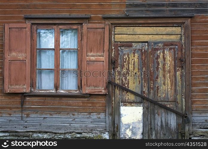 Window and a closed door of a house