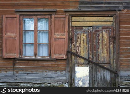 Window and a closed door of a house