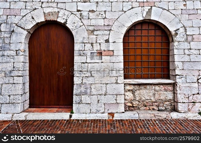 Window and Door on the Facade of the Restored Italian Home