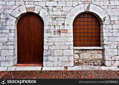 Window and Door on the Facade of the Restored Italian Home
