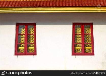 window in bangkok in thailand incision of the buddha gold temple