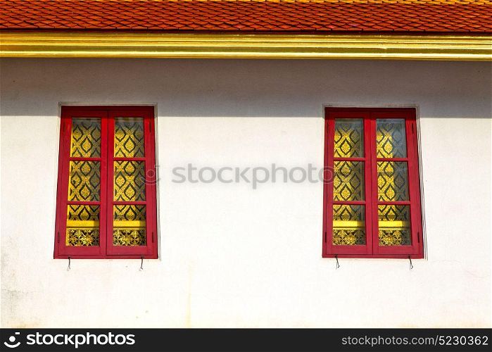 window in bangkok in thailand incision of the buddha gold temple