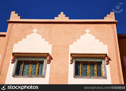 window in morocco africa and old construction wal brick historical