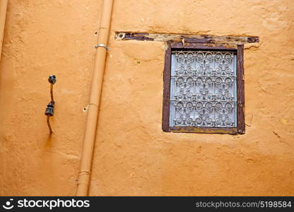 window in morocco africa and old construction wal brick historical