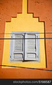 window in morocco africa and old construction wal brick historical