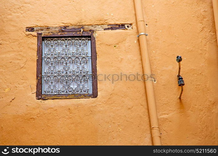 window in morocco africa and old construction wal brick historical