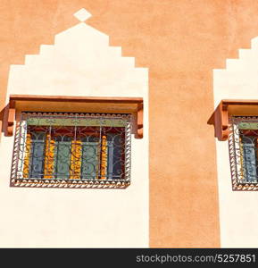 window in morocco africa and old construction wal brick historical